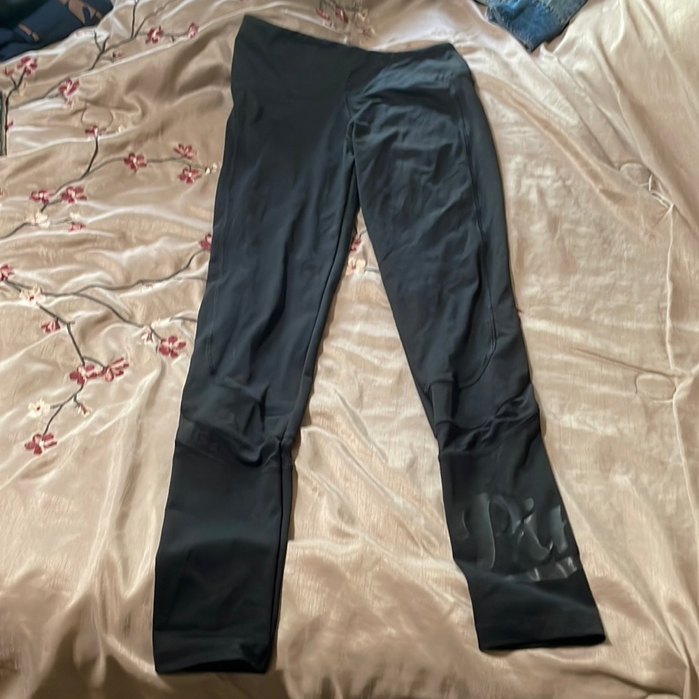 Pink Victoria’s Secret Leggings with mesh sides. Size Small